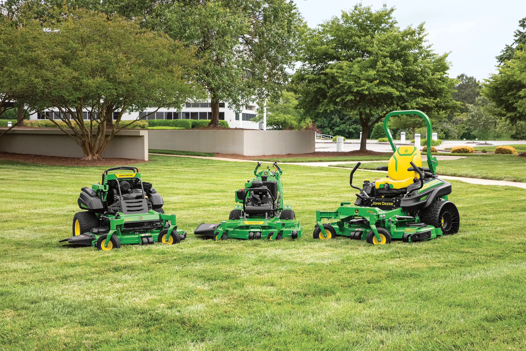 John Deere commercial mowing equipment operating on grass